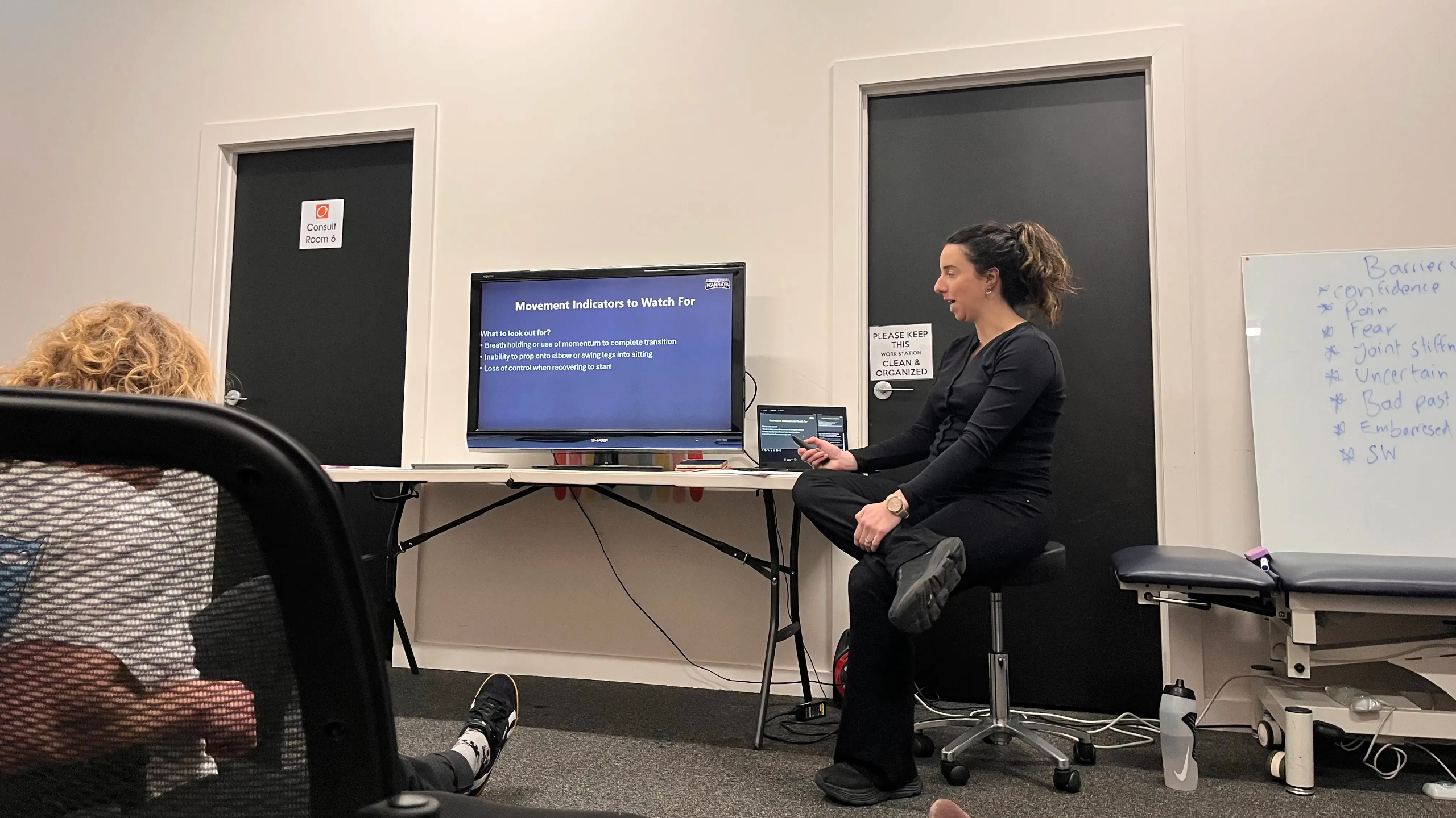Allied health mentor presenting a professional development workshop to clinicians in an Australian training environment